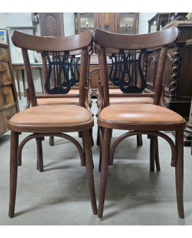 Le village de 58 brocanteurs - Série de 6 chaises vintage en bois courbé, ornées d’un élégant dossier en forme de lyre noire