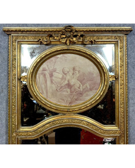 Le village de 58 brocanteurs - Très grand miroir à parecloses, richement sculpté et doré à la feuille, de style Louis XVI