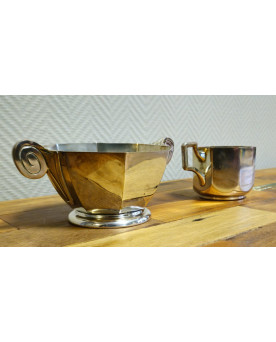 Le village de 58 brocanteurs - Deux piéces de forme époque Art Déco en métal argenté – Sucrier et pot à lait