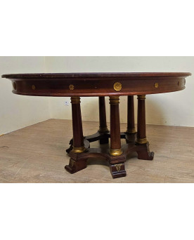 Le village de 58 brocanteurs - Grande table ronde à allonges – piètement à colonnes – époque Empire / acajou