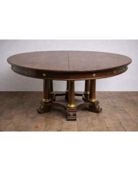 Le village de 58 brocanteurs - Grande table ronde à allonges – piètement à colonnes – époque Empire / acajou